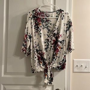 LUQ short sleeve blouse with tie front.